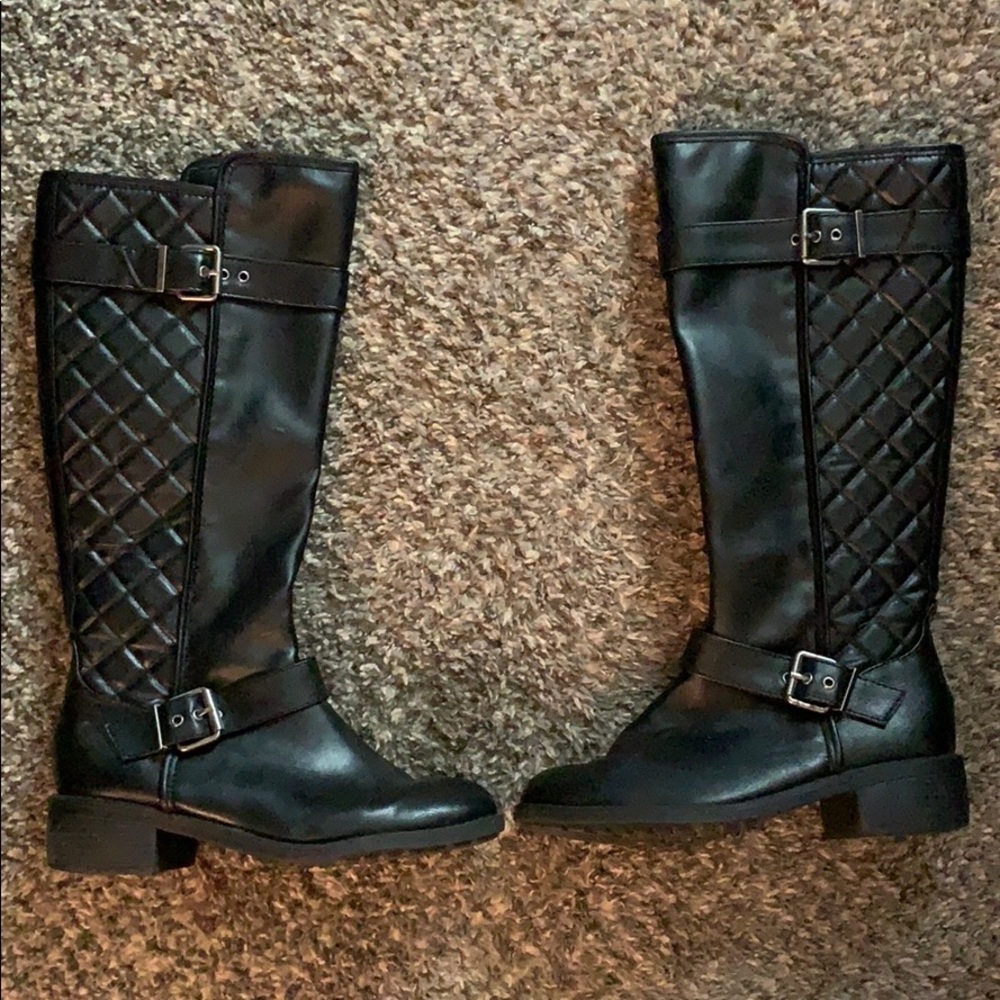 Tall black boots
